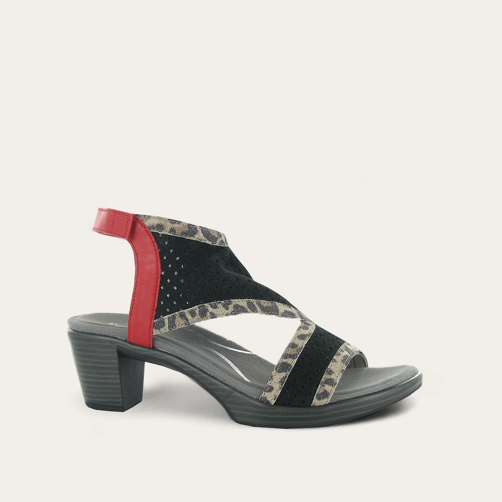 Black sandal with red and patterned straps on a white background