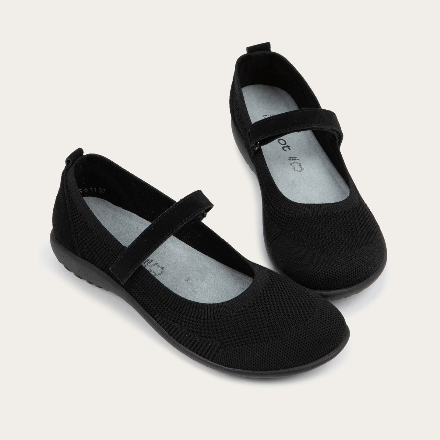 Pair of black knit mary janes.