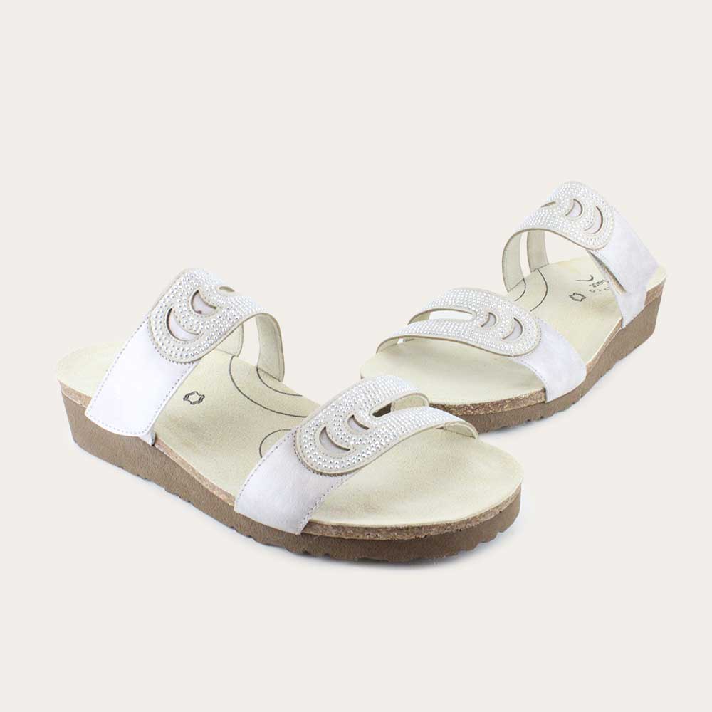 A pair of black sandals with an open toe and slingback design featuring adjustable straps and cut-out details.