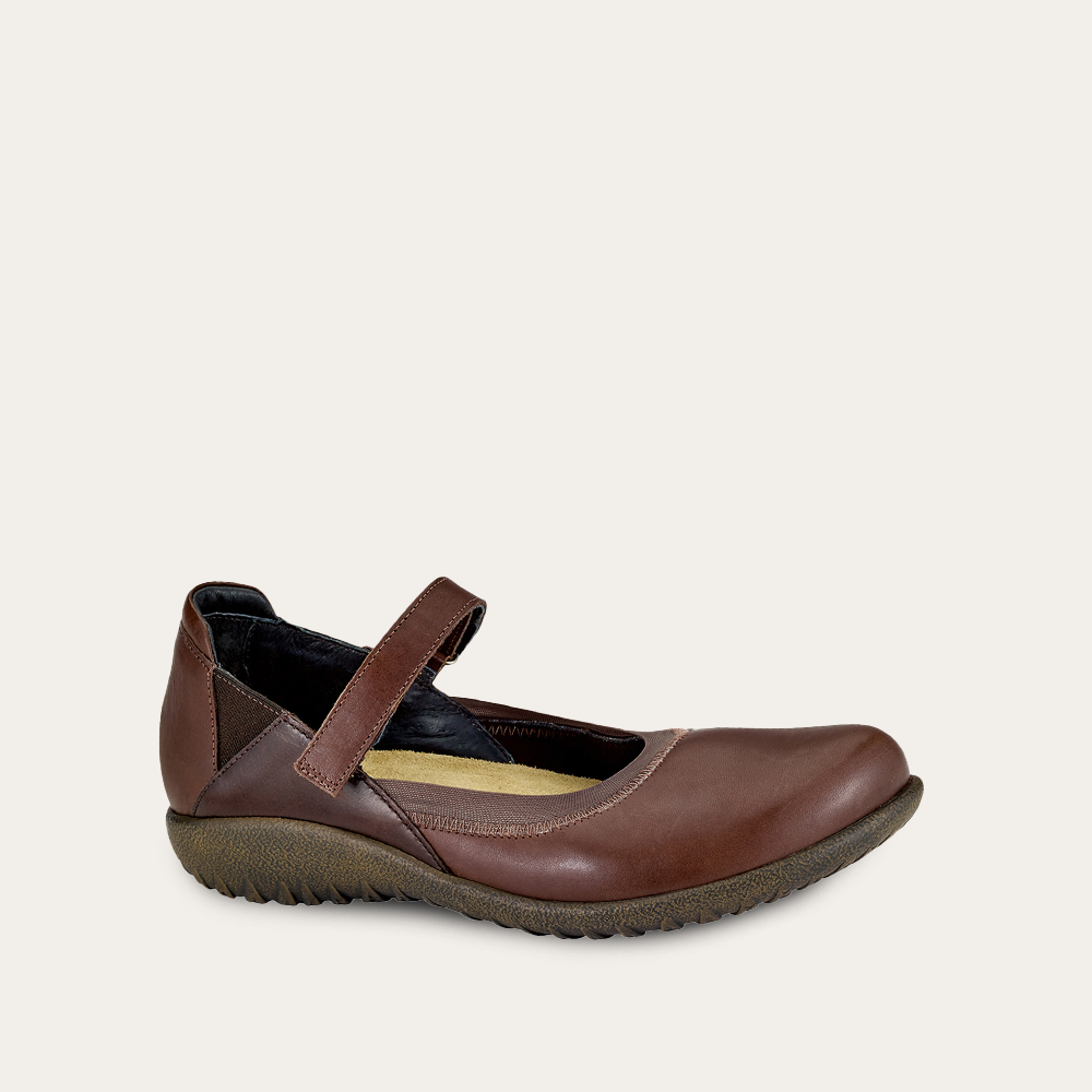 Brown leather flat with strap and textured sole
