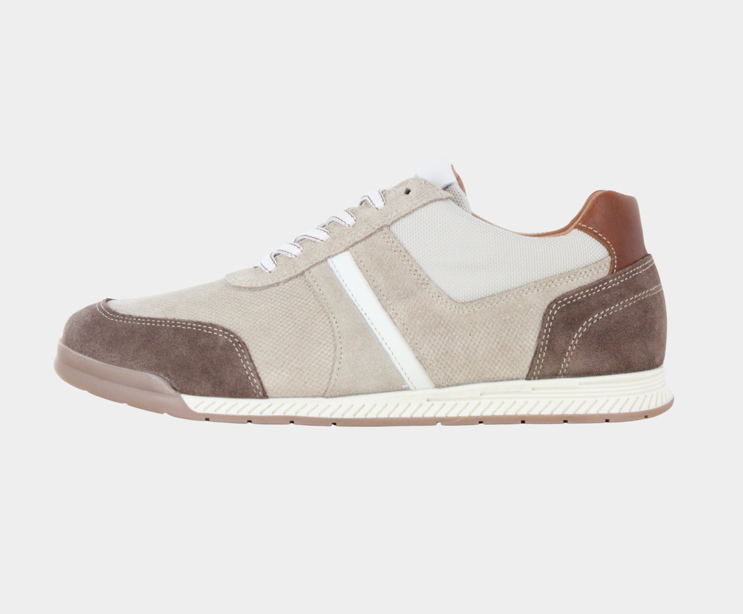 Profile view of a glow-top sneaker featuring beige canvas, light tan suede overlays, a white side stripe, dark brown suede heel, and a white textured rubber sole.