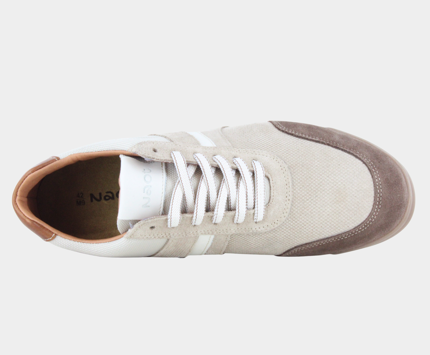 Pair of low-top sneakers featuring a beige canvas, light tan suede overlays, a white side stripes, dark brown suede heels, and white textured rubber soles.