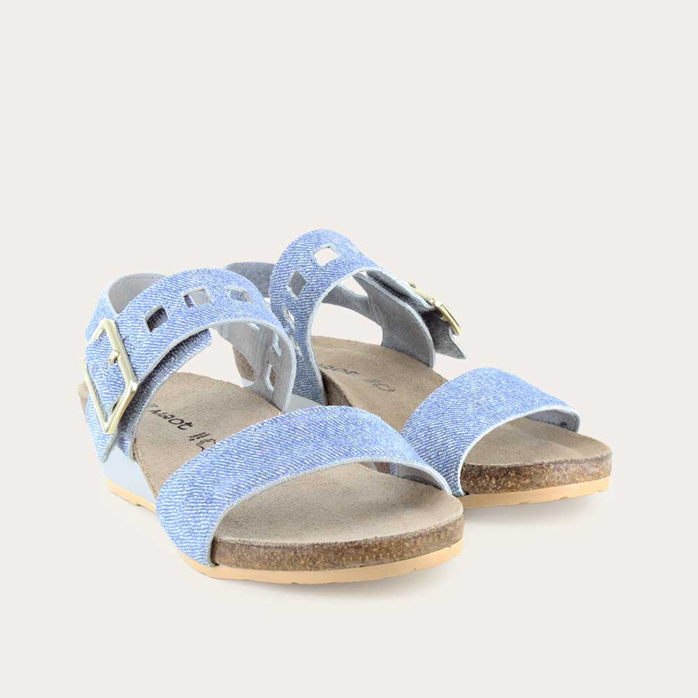 Pair of  blue denim wedge sandals, featuring two straps and a metallic buckle with a cork footbed