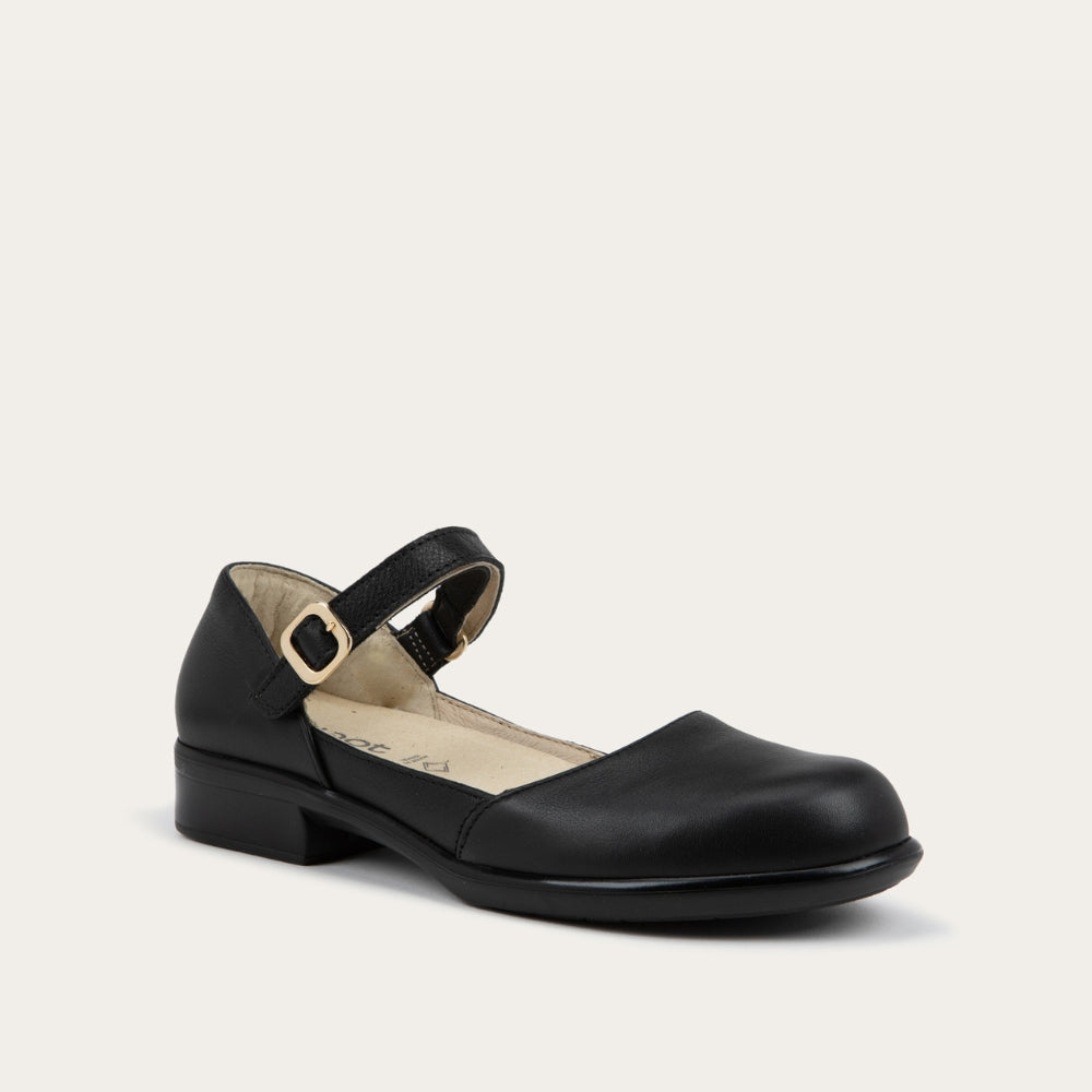 Angled profile view of a black maryjane with a simple buckle strap on a black and brown sole