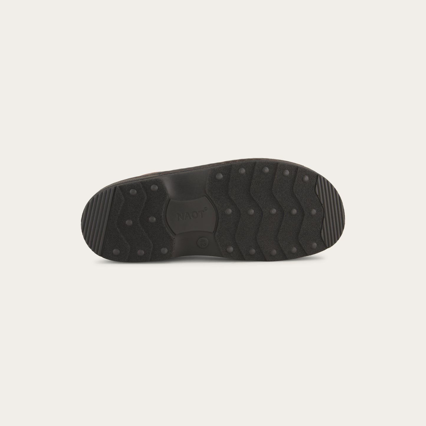 Bottom view of a brown nubuck sandal featuring 3 hook and loop straps around the foot and ankle for adjustability on a black sole.