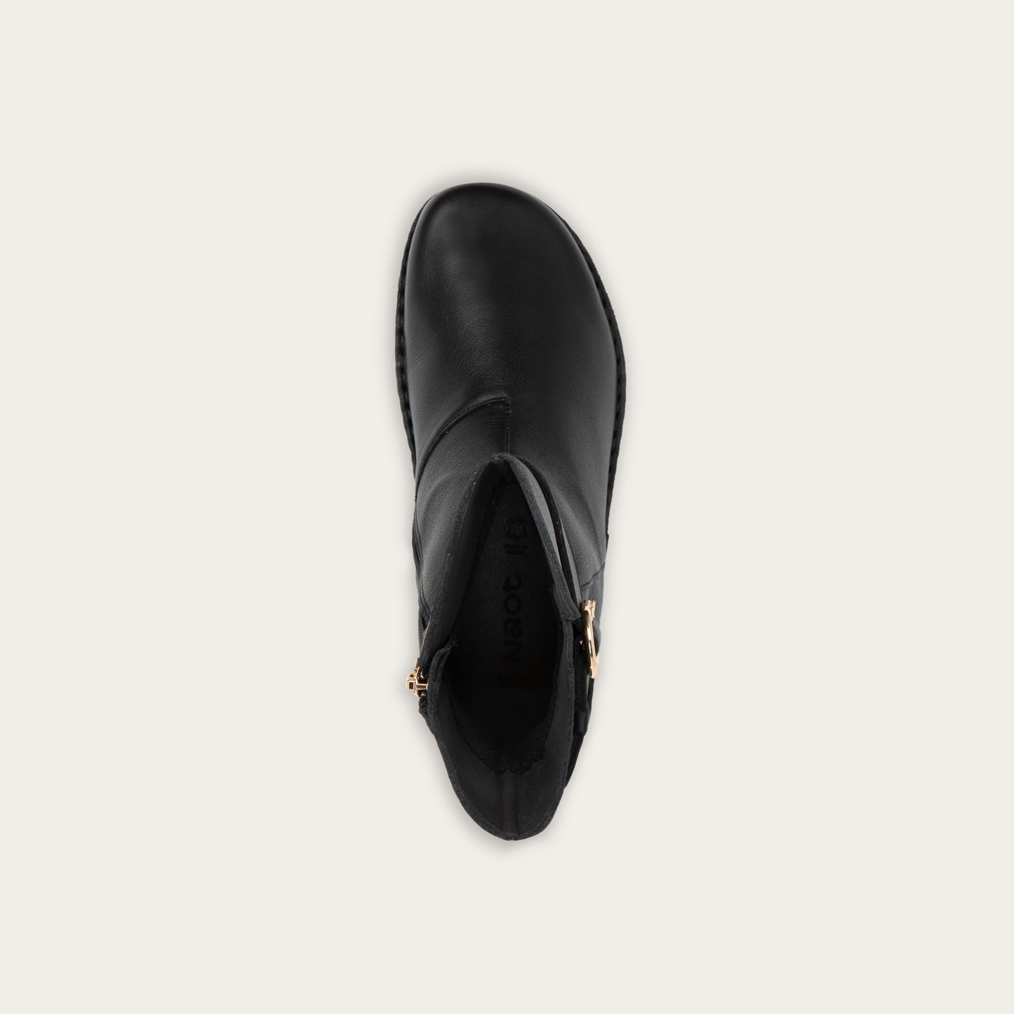 Top view of a black calf boot with a simple strap and buckle detail