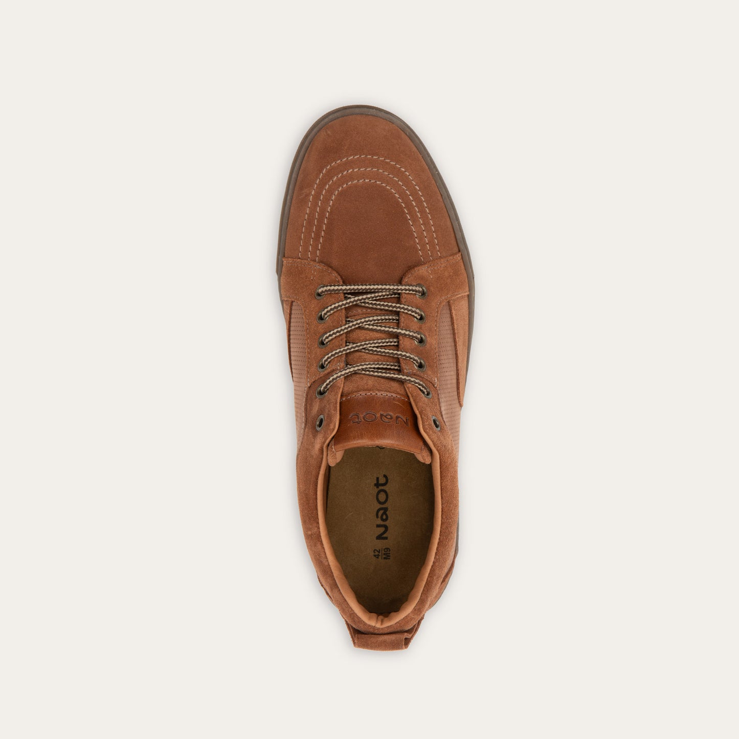 Top view of a brown suede and perforated leather sneaker with matching brown laces and a textured rubber sole.
