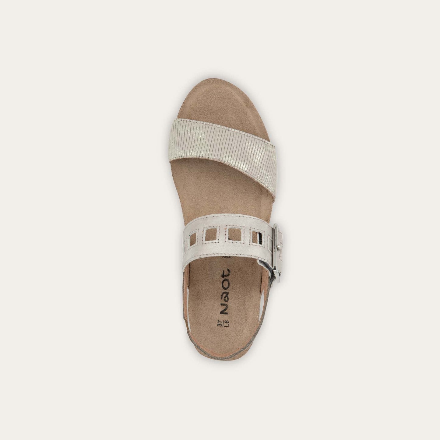 Top view of a grey/beige metalic wedge sandal, featuring two straps and a metallic buckle with a cork footbed.