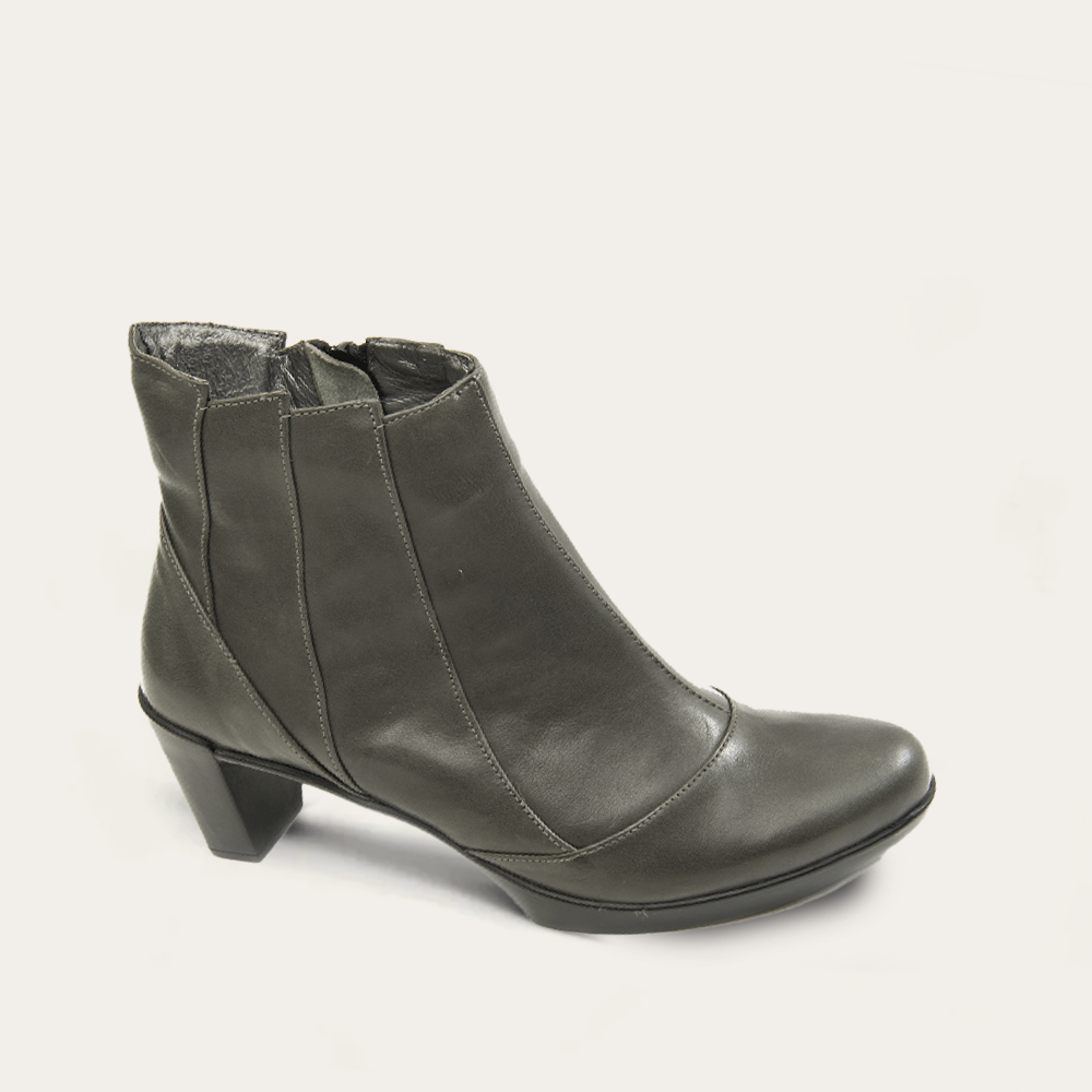 Gray ankle boot on a light gray background