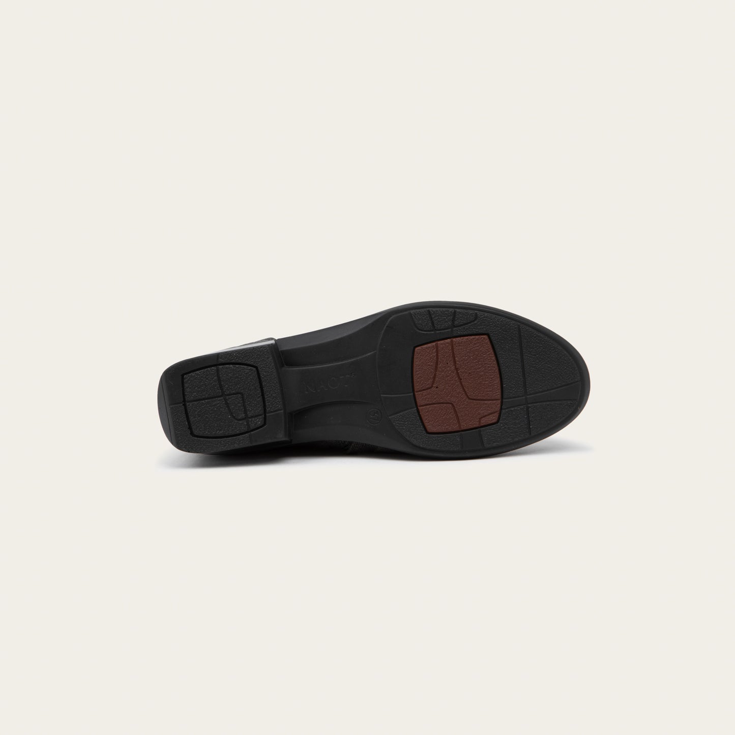 Bottom view of a black suede mid-calf boot with decorative t-strap and buckle, side zipper, rounded toe, and low stacked heel