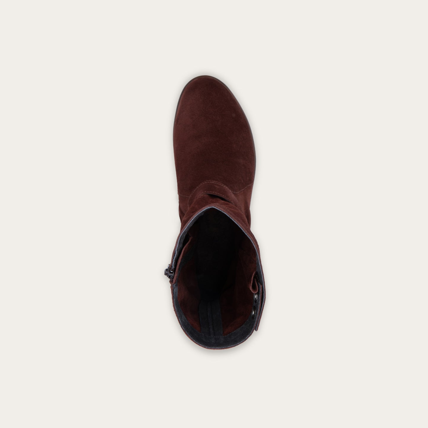 Top view of a violet suede mid-calf boot with decorative t-strap and buckle, side zipper, rounded toe, and low stacked heel