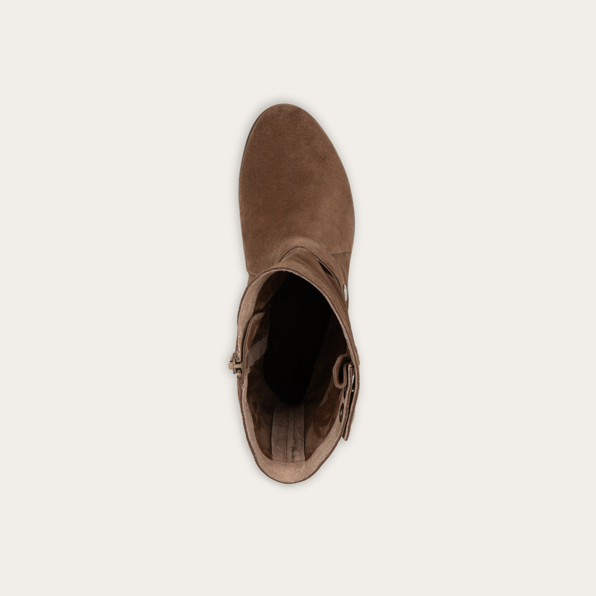 Top view of a brown suede mid-calf boot with decorative t-strap and buckle, side zipper, rounded toe, and low stacked heel
