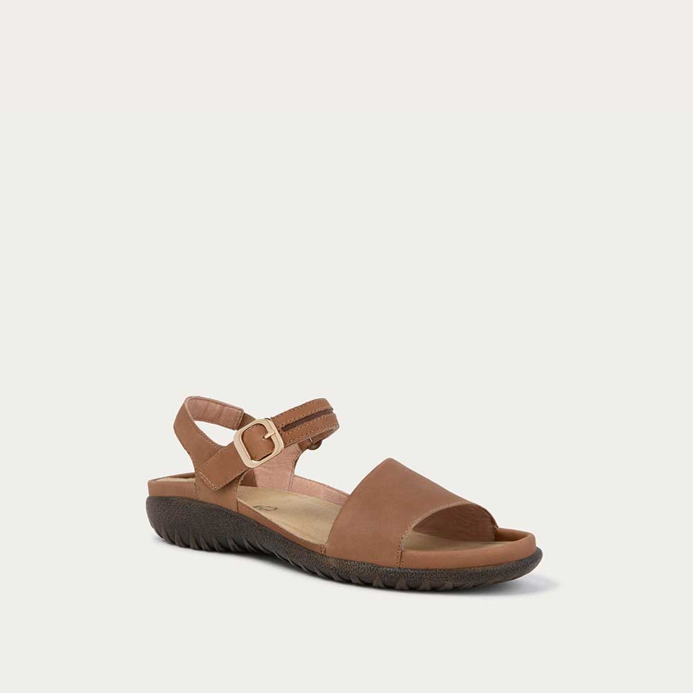 Angled profile view of a black, open toe sandal, featuring a toe strap and asjustable ankle strap with a silver accent buckle.