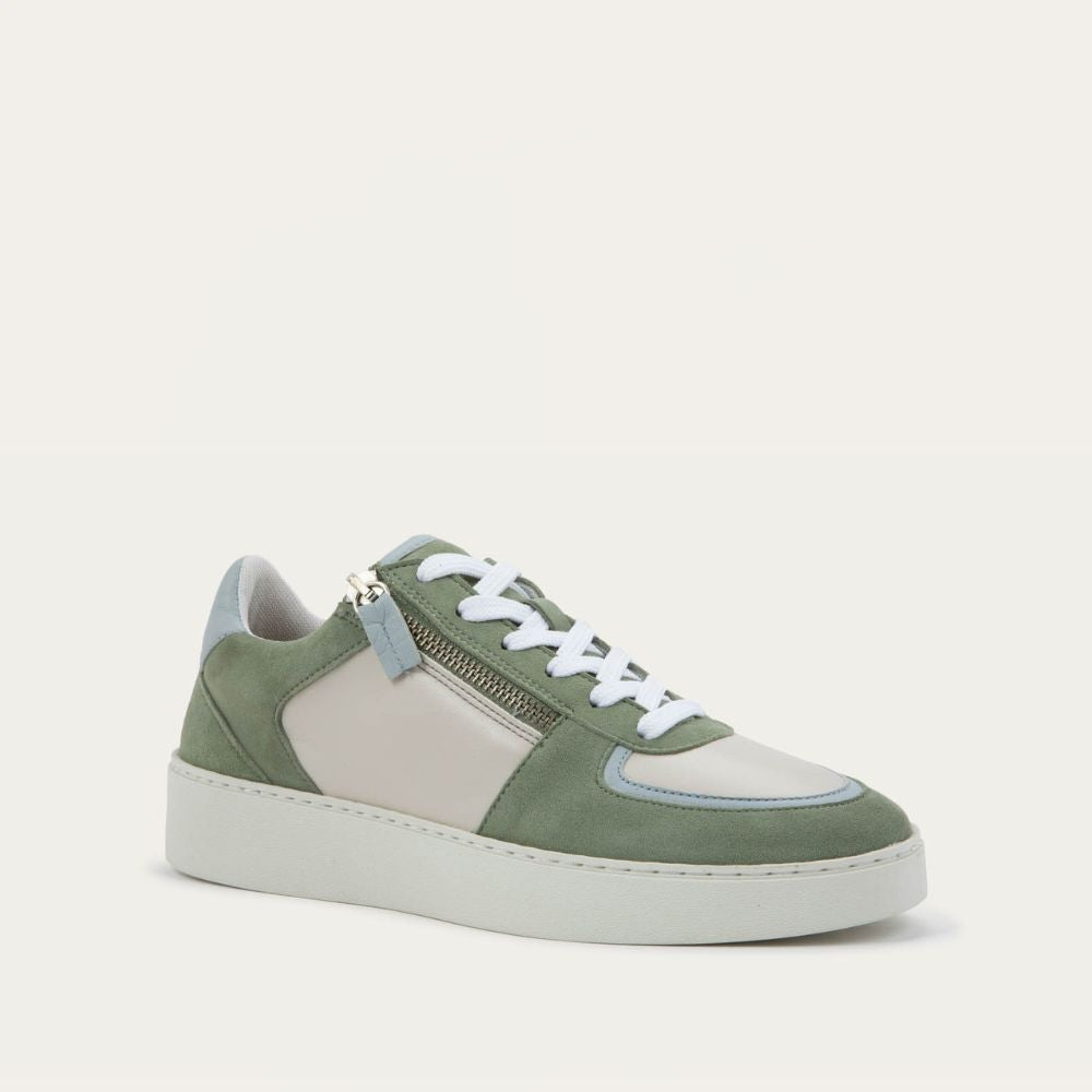 Angled profile view of a multicolored green and white sneaker with laces and a side zipper.