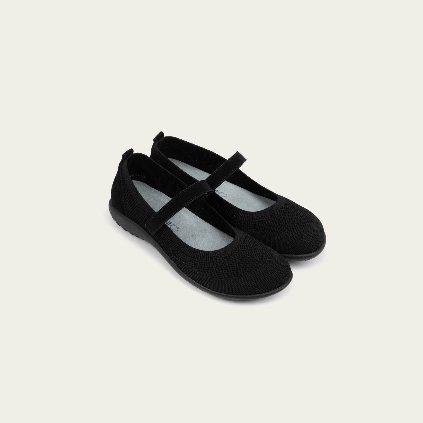 Pair of black knit mary janes.