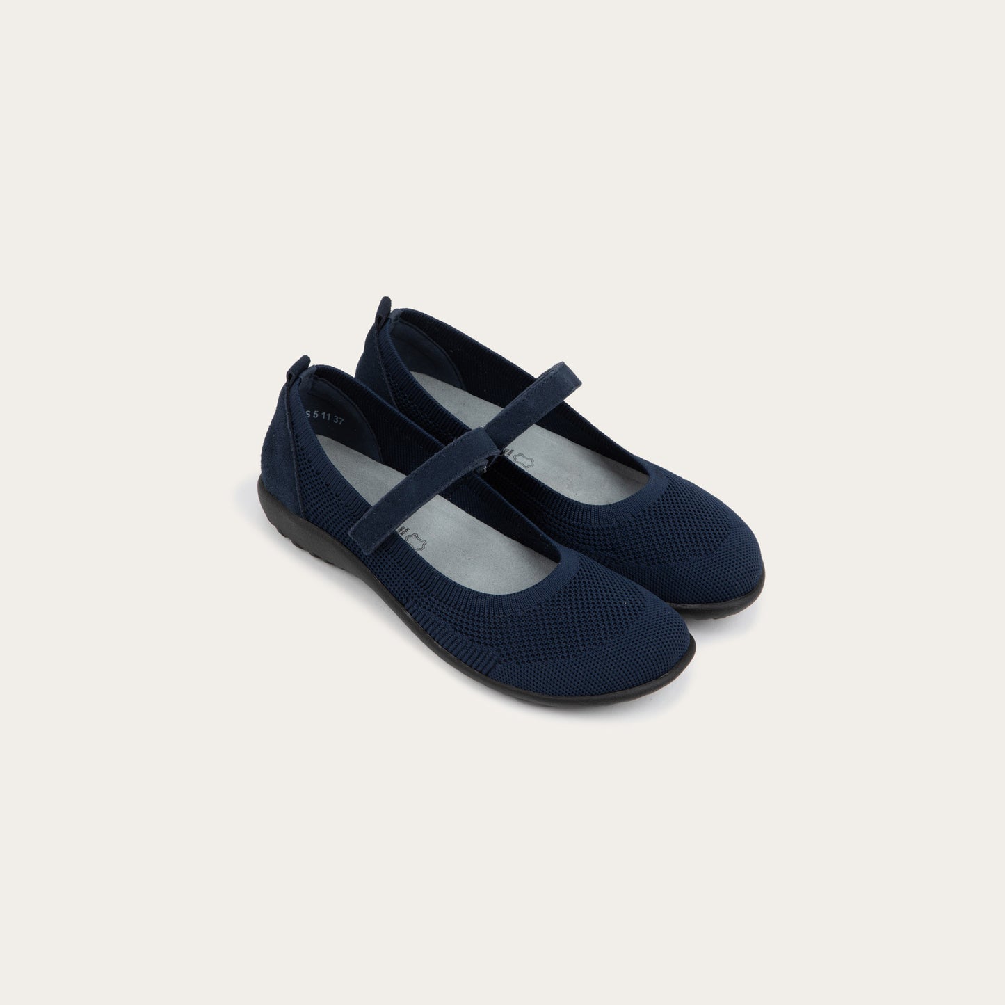 Pair of blue knit mary janes.