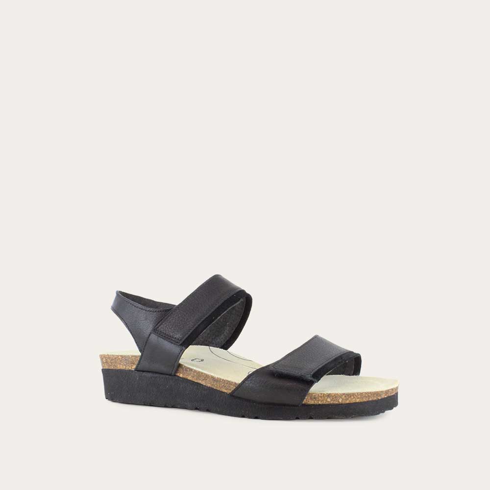 Angled profile view of a black leather sandal with two adjustable straps and a cork platform sole.
