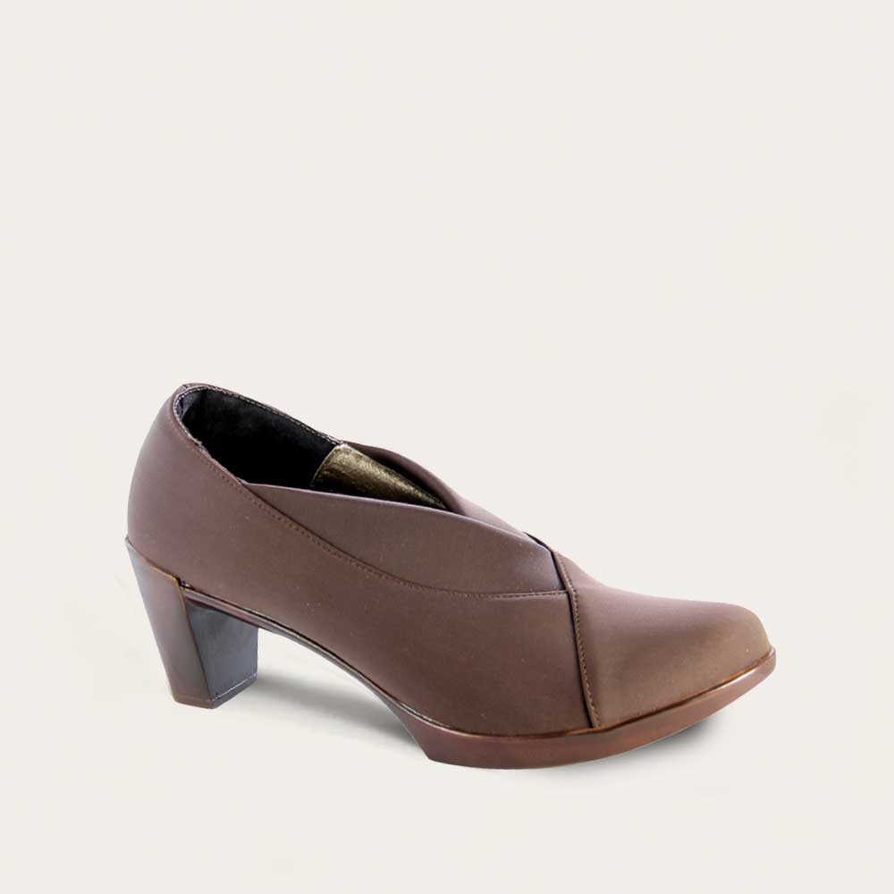 Brown heeled bootie on a brown sole