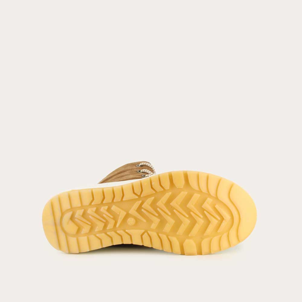 Brown lace up winter boot with white accents and sole