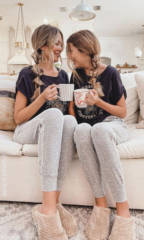 2 women on a couch wearing naot slippers #NAOTIC Instagram